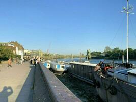 A view of the River Thames at Hammersmith showing the bridge photo