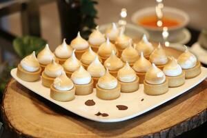 Catering buffet food indoor in luxury restaurant. Dessert table photo