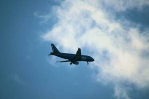 London in the UK on 5 November 2023. An aeroplane approaching London's Heathrow AirportLondo photo