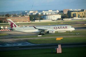 London in the UK on 5 November 2023. An aircraft on the runway at London's Heathrow Airport photo