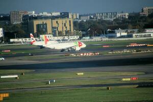 London in the UK on 5 November 2023. An aircraft on the runway at London's Heathrow Airport photo