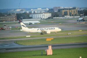 London in the UK on 5 November 2023. An aircraft on the runway at London's Heathrow Airport photo