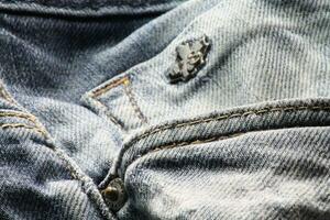 Close-up of blue jeans and denim details. photo