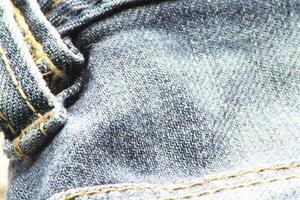 Close-up of blue jeans and denim details. photo