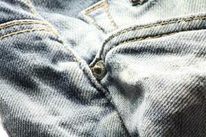 Close-up of blue jeans and denim details. photo