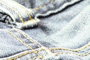 Close-up of blue jeans and denim details. photo