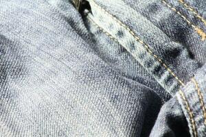 Close-up of blue jeans and denim details. photo