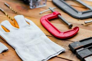 Collection of woodworking tools on a wooden background. photo