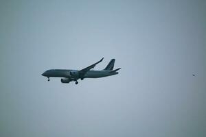 Knutsford in the UK in June 2023. An aeroplane approaching Manchester Airport photo