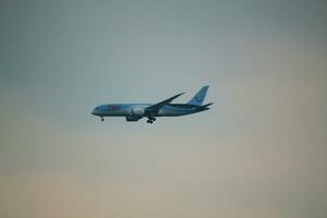 Knutsford in the UK in June 2023. An aeroplane approaching Manchester Airport photo