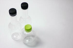 plastic bottles of water on a white background. plastic bottles for drinking water photo