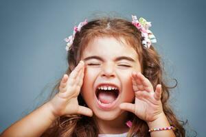 Little girl screaming photo