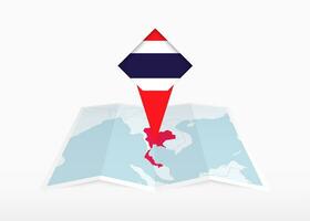 Thailand is depicted on a folded paper map and pinned location marker with flag of Thailand. vector