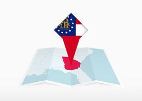 Georgia is depicted on a folded paper map and pinned location marker with flag of Georgia. vector