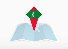 Maldives is depicted on a folded paper map and pinned location marker with flag of Maldives. vector