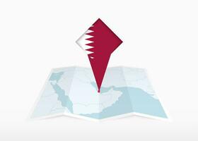 Qatar is depicted on a folded paper map and pinned location marker with flag of Qatar. vector