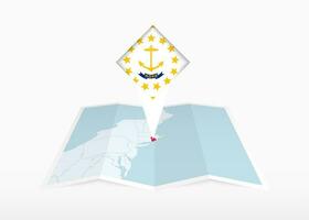 Rhode Island is depicted on a folded paper map and pinned location marker with flag of Rhode Island. vector