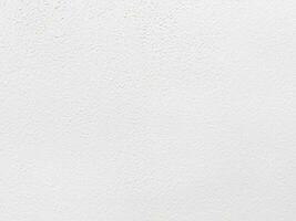 Seamless texture of white cement wall a rough surface, with space for text, for a background. photo