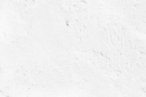 Blank concrete white rough wall for background. Beautiful white wall surface background pattern. photo