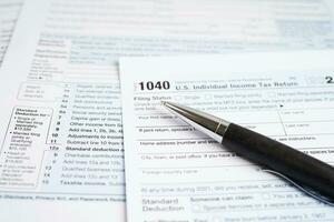 Tax form 1040 U.S. Individual Income Tax Return, business finance concept. photo