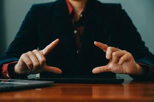 Corporate Communication. Asian Businesswoman Talking On Mobile Phone Working On Laptop In Modern Office. Free Space photo