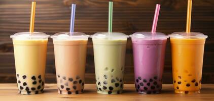 AI generated Plastic cups of different tasty bubble tea on wooden background. Generative AI photo