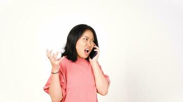 Angry asian woman talking on the phone. Isolated on white background. photo