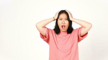 Young asian woman with surprise and shocked expression on white background. photo