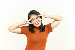 Showing Peace Sign Of Beautiful Asian Woman Isolated On White Background photo