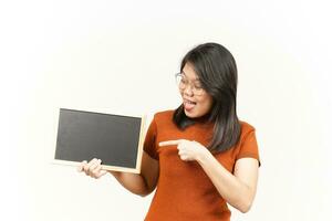 Showing, Presenting and holding Blank Blackboard Of Beautiful Asian Woman Isolated On White Background photo