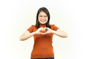 Showing Love or Heart Sign Of Beautiful Asian Woman Isolated On White Background photo