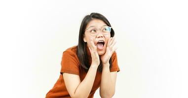 Shouting out loud with hands over mouth Of Beautiful Asian Woman Isolated On White Background photo