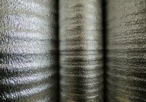 Foiled Heat Insulation Rolls Side View Texture Background photo