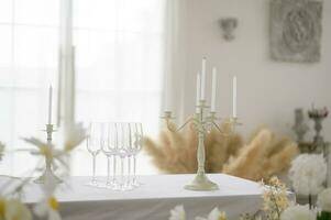 Welcome to wedding sign and reception table decorated with flowers photo