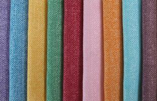 Colorful background, A stack of colorful fabric. Full frame shot of muti colored fabric background photo