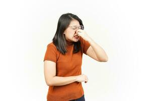 Smelling something stinky and disgusting Of Beautiful Asian Woman Isolated On White Background photo