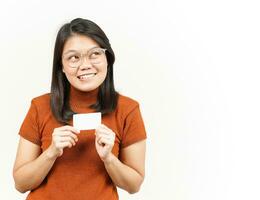 Holding Blank Bank Card Or Credit Card Of Beautiful Asian Woman Isolated On White Background photo