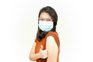 Wearing Mask And Get A Corona Virus Vaccine Of Beautiful Asian Woman Isolated On White Background photo