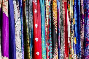 colorful fabric at a market stall photo