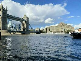 A view of Tower Bridge opening and closing its drawbridge photo