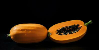 AI generated two papaya's are shown on a black table photo