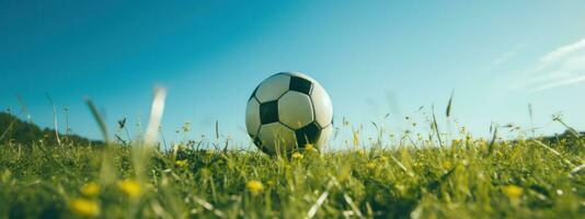 ai generado fútbol pelota con portero en herboso campo foto