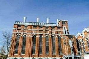 a large brick building with many windows photo