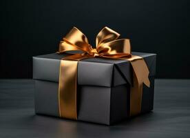 AI generated elegantly tied golden ribbon wrapped in black gift box on black background photo