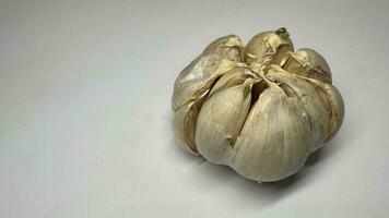 Garlic clove isolated. Garlic cloves set on white background. Unpeeled white garlic cloves collection. With clipping path. Full depth of field. photo