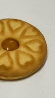 Pineapple jam biscuits, cookie neatly arranged and photographed on a plain white background photo