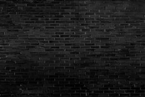 Abstract black brick wall pattern background and black backdrop, Blank copy space. photo