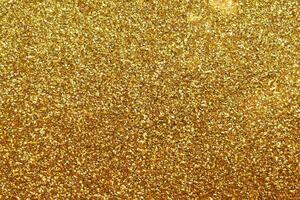 Abstract gold glitter sparkle background photo