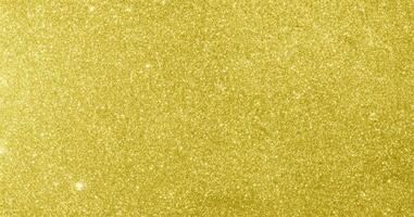 Abstract gold glitter sparkle bokeh light background photo