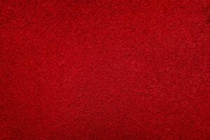 Macro texture of red suede. Red suede leather background. photo